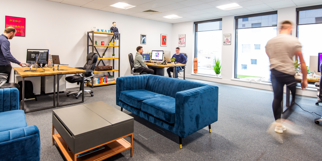 A photograph of The Base space with desks